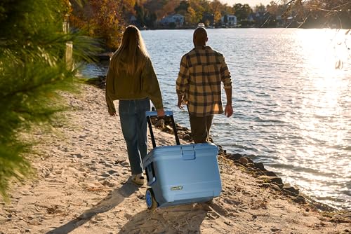 Coleman Pro Heavy-Duty 55qt Wheeled Ultra-Light Premium Hard Cooler, Extra-Thick Insulation Keeps Ice up to 5 Days, 92-Can Capacity, Heavy-Duty Wheels